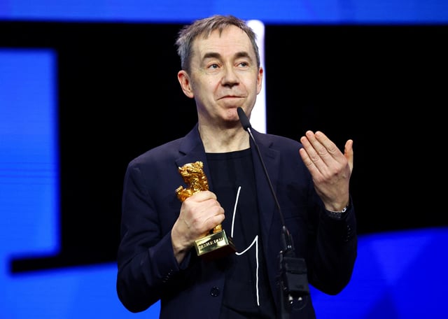 Dag Johan Haugerud holds the Golden Bear for Best Film for "Dreams (Sex Love)" as he speaks during the awards ceremony at the 75th Berlinale International Film Festival in Berlin, Germany, February 22, 2025. REUTERS/Fabrizio Bensch