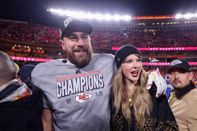 Taylor Swift celebrates with Travis Kelce #87 of the Kansas City Chiefs after defeating the Buffalo Bills 32-29 in the AFC Championship Game at GEHA Field at Arrowhead Stadium on January 26, 2025 in Kansas City, Missouri.