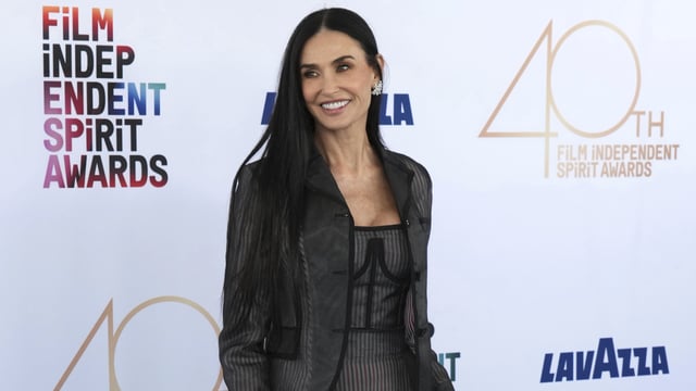 Demi Moore arrives at the Film Independent Spirit Awards on February 22, 2025. The event, held at the Santa Monica Pier in Los Angeles, saw a stunning array of celebrities donning sheer and stylish outfits.
