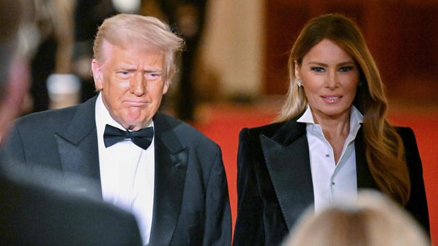 First Lady Melania Trump and President Donald Trump arrive for the National Governors Association Evening Dinner and Reception in the East Room of the White House in Washington, DC, on February 22, 2025. (Photo by ROBERTO SCHMIDT / AFP)