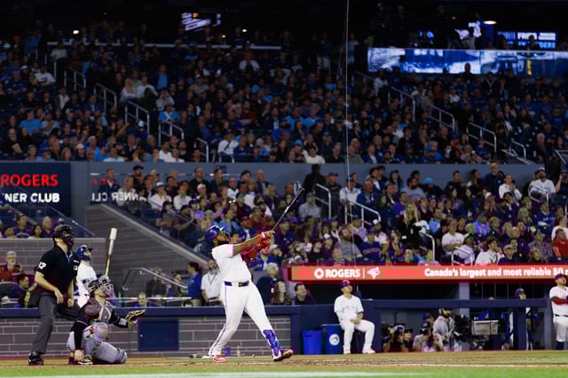 TORONTO, CANADA - SEPTEMBER 27: Vladimir Guerrero Jr. #27 of the Toronto Blue Jays at bat during their MLB game against the Miami Marlins at Rogers Centre on September 27, 2024 in Toronto, Ontario, Canada.