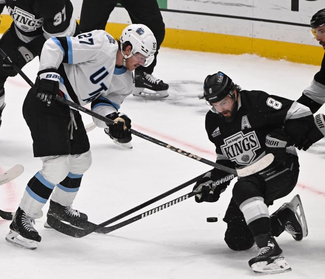 Drew Doughty #8 of the Los Angeles Kings fights for the puck again Barrett Hayton #27 of the Utah Hockey Club during the first period of a NHL hockey game at Crypto.com Arena in Los Angeles on Saturday, Feb. 22, 2025. (Photo by Keith Birmingham, Orange County Register/ SCNG)