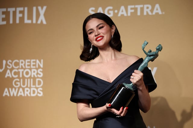 Selena Gomez poses with the Outstanding Performance by an Ensemble in a Comedy Series award for "Only Murders in the Building" at the 31st Screen Actors Guild Awards, in Los Angeles, California, U.S., February 23, 2025. REUTERS/Daniel Cole