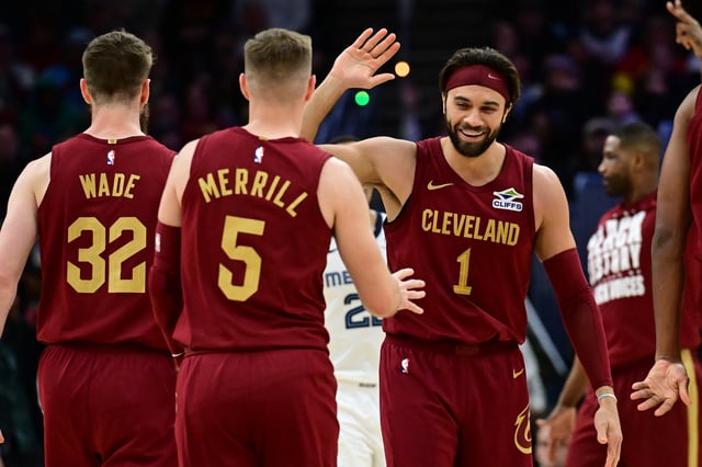 Feb 23, 2025; Cleveland, Ohio, USA; Cleveland Cavaliers guard Max Strus (1) celebrates with guard Sam Merrill (5) during the second half against the Memphis Grizzlies at Rocket Arena. Mandatory Credit: Ken Blaze-Imagn Images