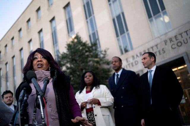 Georgia election worker Ruby Freeman Moss speaks during a press conference after a jury ordered Former New York Mayor Rudy Giuliani to pay her and her daughter, Shaye Moss, $148 million in damages outside the U.S. District Courthouse in Washington, U.S., December 15, 2023. REUTERS/Bonnie Cash/File Photo