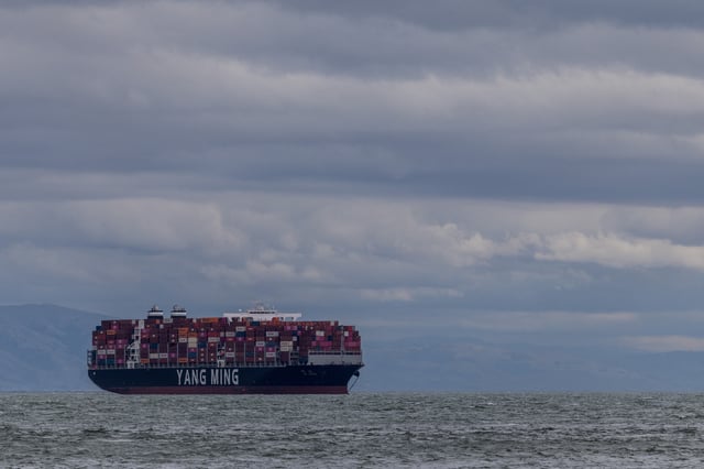 A cargo ship full of containers is seen at the port of Oakland as trade tensions escalate over U.S. tariffs, in Oakland, California, U.S., February 3, 2025. REUTERS/Carlos Barria/File Photo