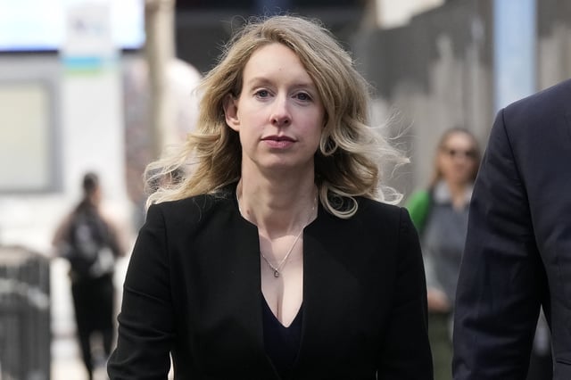 FILE - Former Theranos CEO Elizabeth Holmes leaves federal court in San Jose, Calif., March 17, 2023. (AP Photo/Jeff Chiu, File)