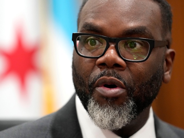 Chicago Mayor Brandon Johnson responds to a question in his City Hall office during an interview with The Associated Press Monday, May 6, 2024, in Chicago. The rookie mayor's bumpy first year has been a test of his progressive credentials. He's navigated an evolving migrant crisis, budget gaps, persistent crime and a troubled transit system to name a few. While there have been wins for workers and social services, he's struggled with businesses, police and fellow Democrats. (Charles Rex Arbogast/AP)