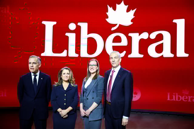 Canada's Liberal Party leadership candidates, former Bank of Canada governor Mark Carney, former Deputy Prime Minister and Finance Minister Chrystia Freeland, former House leader Karina Gould and former Liberal MP Frank Baylis stand next to each other before participating in a French language debate ahead of the March 9 vote to replace Prime Minister Justin Trudeau, in Montreal, Quebec, Canada, February 24, 2025.  REUTERS/Evan Buhler