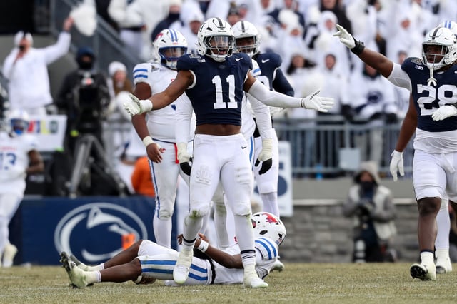 Dec 21, 2024; University Park, Pennsylvania, USA; Penn State Nittany Lions defensive end Abdul Carter (11) reacts after sacking Southern Methodist Mustangs quarterback Kevin Jennings (7) during the third quarter in the first round of the College Football Playoff at Beaver Stadium. Mandatory Credit: Matthew O'Haren-Imagn Images/File Photo