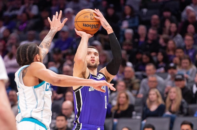Feb 24, 2025; Sacramento, California, USA; Sacramento Kings guard Zach LaVine (8) takes a jump shot during the second quarter against the Charlotte Hornets at Golden 1 Center. Mandatory Credit: Ed Szczepanski-Imagn Images