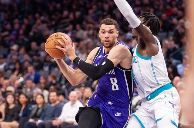 Feb 24, 2025; Sacramento, California, USA; Sacramento Kings guard Zach LaVine (8) drives to the basket against the Charlotte Hornets during the second quarter at Golden 1 Center. Mandatory Credit: Ed Szczepanski-Imagn Images