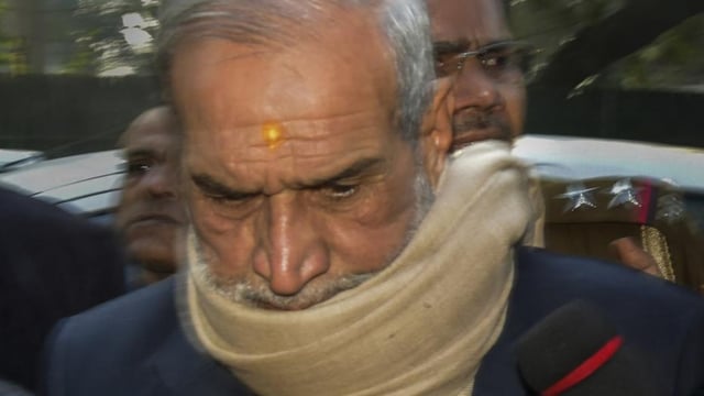 In this December 2018 file photo, Congress leader Sajjan Kumar is seen outside the Patiala House Court of New Delhi. 