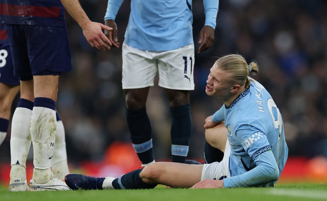 Soccer Football - Premier League - Manchester City v Newcastle United - Etihad Stadium, Manchester, Britain - February 15, 2025 Manchester City's Erling Haaland reacts after sustaining an injury REUTERS/Phil Noble/File Photo