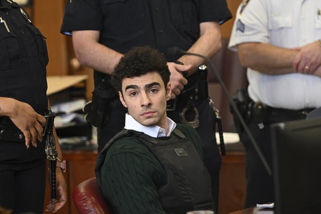 Luigi Mangione, accused of fatally shooting Brian Thompson, the CEO of UnitedHealthcare, appears in Manhattan state court in New York, Friday, Feb. 21, 2025.