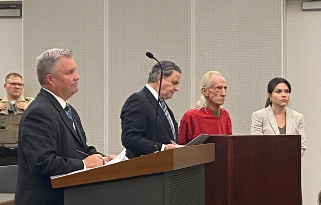 Joseph Czuba with his attorneys during his arraignment at Will County Courthouse, in Joliet, Ill., on Oct. 30, 2023.