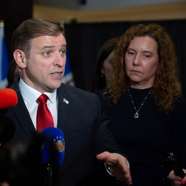 Newfoundland and Labrador Premier Andrew Furey holds a news conference as his wife Allison looks on in St.John's, Tuesday, Feb. 25, 2025. Furey announced his resignation as premier. THE CANADIAN PRESS/Paul Daly
