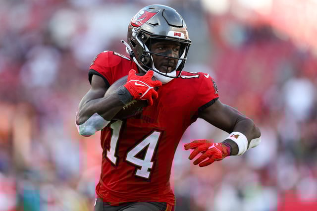 Dec 31, 2023; Tampa, Florida, USA;  Tampa Bay Buccaneers wide receiver Chris Godwin (14) catches a pass for a touchdown against the New Orleans Saints in the fourth quarter at Raymond James Stadium. Mandatory Credit: Nathan Ray Seebeck-USA TODAY Sports/File Photo
