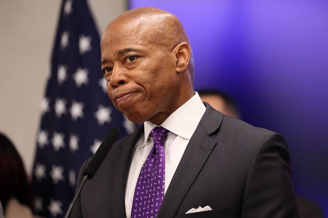 New York Mayor Eric Adams listens to questions from reporters during a press conference at NYPD's 40th Precinct on February 20, 2025, in New York City.