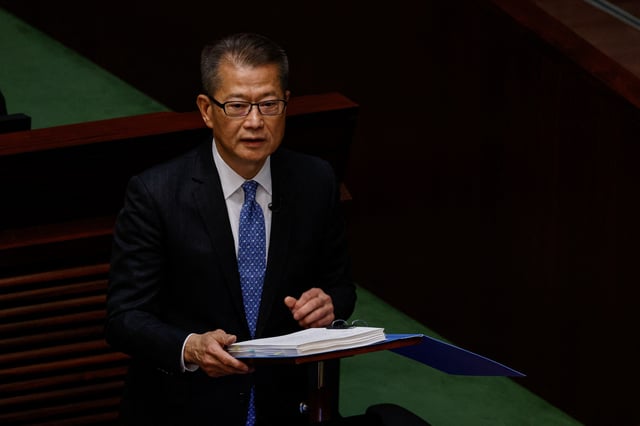 Hong Kong's Finance Secretary Paul Chan delivers the annual budget address at the Legislative Council in Hong Kong, China Feburary 26, 2025. REUTERS/Tyrone Siu