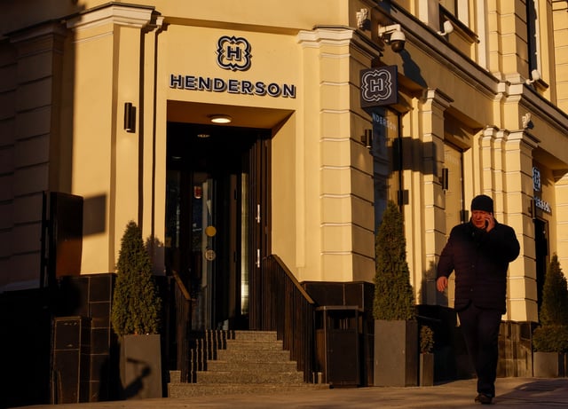 A man walks past a store of Russian clothing retailer Henderson in Moscow, Russia February 25, 2025.  REUTERS/Shamil Zhumatov