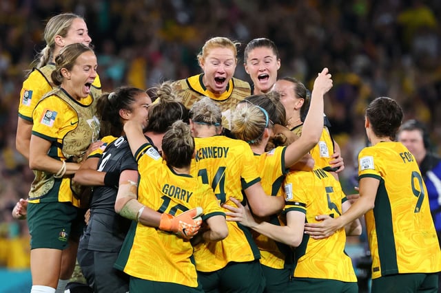 Australian players celebrate after winning the Women's World Cup quarterfinal soccer match against France in Brisbane, Australia, on August. 12, 2023.