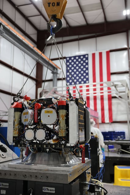 The AstroForge Odin spacecraft is seen inside testing and development facilities.
