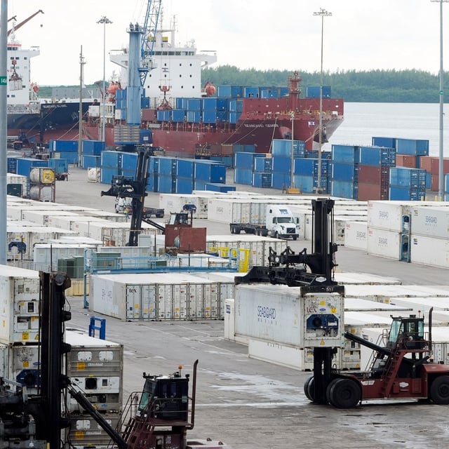 FILE - Dockworkers return to work at Port Miami, Oct. 4, 2024, in Miami, after the union representing 45,000 striking U.S. dockworkers at East and Gulf coast ports has reached a deal to suspend a three-day strike until Jan. 15 to provide time to negotiate a new contract. (AP Photo/Marta Lavandier, File)