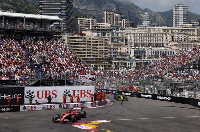 Formula One F1 - Monaco Grand Prix - Circuit de Monaco, Monaco - May 26, 2024 Ferrari's Charles Leclerc leads as a steward waves a red flag to stop the race REUTERS/Claudia Greco/Pool/File Photo