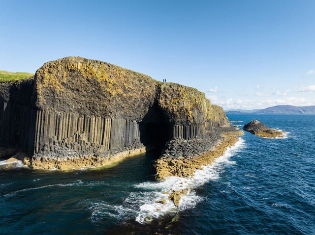 The mineral makeup of sediments during an ancient deep freeze when glaciers crept toward the sea, eroding Earth's crust, greatly differed from that of later sediments when the planet was a hothouse, a study found. Fingal's Cave on Staffa island, which has distinctive basalt columns, is seen in Scotland's Hebrides.