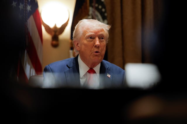 U.S. President Donald Trump hosts his first cabinet meeting with Elon Musk in attendance, Washington, D.C.,  U.S., February 26, 2025. REUTERS/Brian Snyder