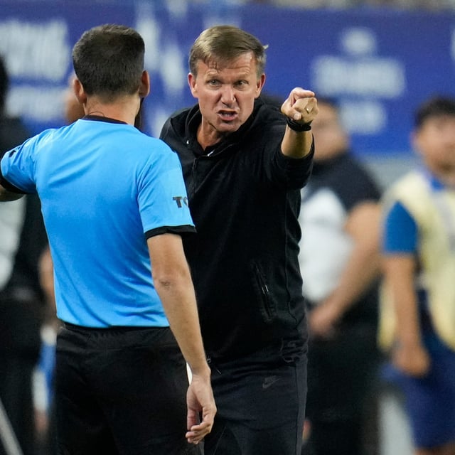 Canada head coach Jesse Marsch, right, disputes a call during a Copa America quarterfinal soccer match between Venezuela and Canada, Friday, July 5, 2024, in Arlington, Texas. Marsch waded into politics Wednesday, telling President Donald Trump "to lay off the ridiculous rhetoric about Canada being a 51st state." THE CANADIAN PRESS/AP/Julio Cortez