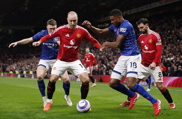 Soccer Football - Premier League - Manchester United v Ipswich Town - Old Trafford, Manchester, Britain - February 26, 2025 Manchester United's Christian Eriksen in action with Ipswich Town's Jack Taylor and Ipswich Town's Ben Johnson Action Images via Reuters/Jason Cairnduff