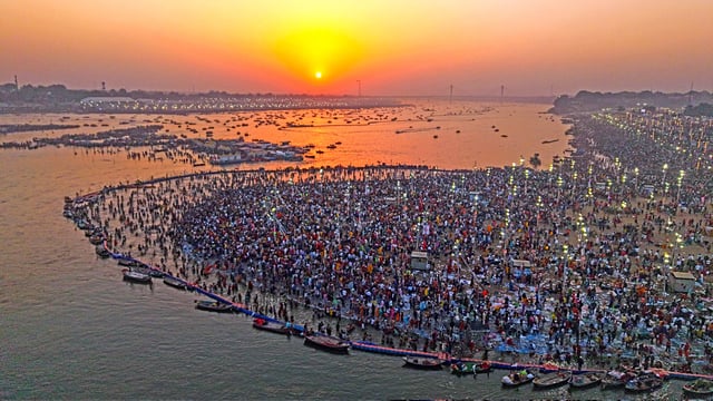 A view of Triveni Sangam during sunset as devotees offer prayers on the occasion of Mahashivratri and the last day of Mahakumbh (ANI)