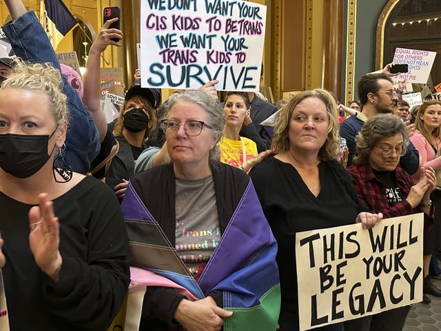 Protesters filled the Iowa state Capitol in Des Moines on Monday, Feb. 24, 2025, to denounce a bill that would strip the state civil rights code of protections based on gender identity. (AP Photo/Hannah Fingerhut)