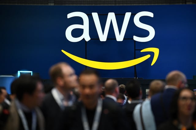 An Amazon Web Services (AWS) logo is pictured during a trade fair in Hannover Messe, in Hanover, Germany, April 22, 2024.  REUTERS/Annegret Hilse/File Photo
