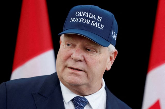 Ontario Premier Doug Ford, wearing a "Canada is not for sale" hat, speaks to journalists at a provincial and territorial leaders meeting in Ottawa, Ontario, Canada January 15, 2025. REUTERS/Blair Gable/File Photo