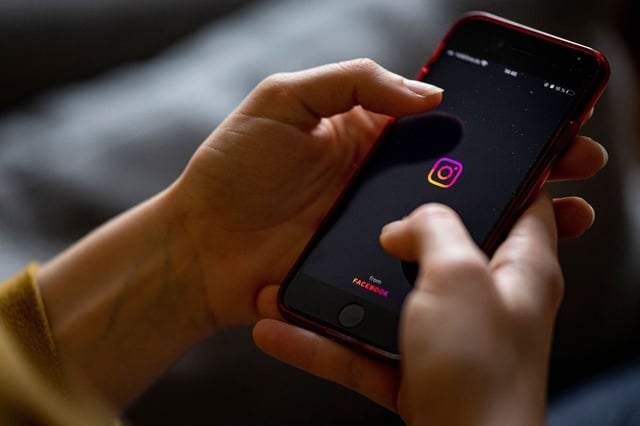 A smartphone with Instagram's app logo.