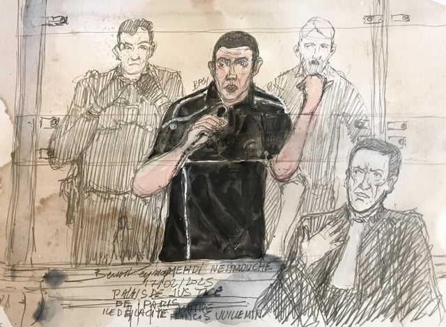 L’accusé Mehdi Nemmouche et son avocat, Me Francis Vuillemin, au procès des tortionnaires de Daech.