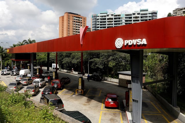 The corporate logo of the state oil company PDVSA is seen at a gas station in Caracas, Venezuela November 16, 2017. REUTERS/Marco Bello/File Photo