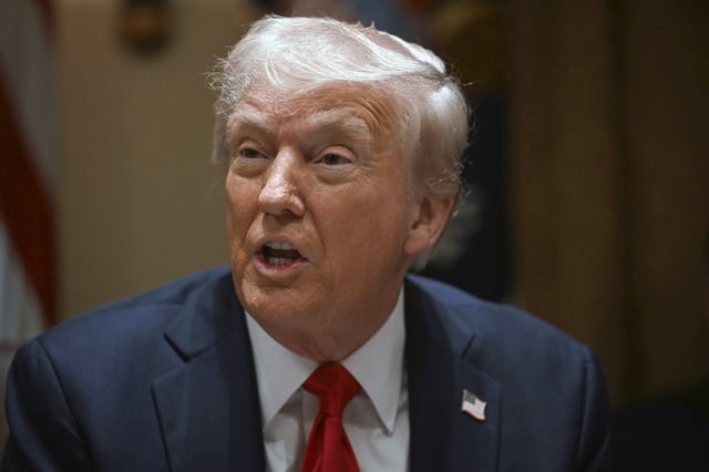 President Donald Trump speaking during his first cabinet meeting at the White House in Washington on February 26, 2025.