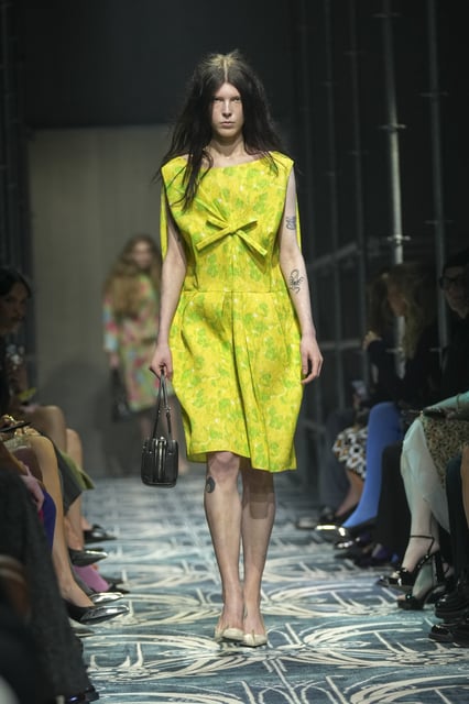 A model wears a creation as part of the Prada Fall/Winter 2025-2026 Womenswear collection presented in Milan, Italy, Thursday, Feb. 27, 2025. (AP Photo/Antonio Calanni)