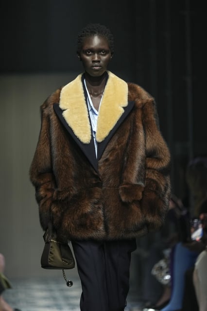 A model wears a creation as part of the Prada Fall/Winter 2025-2026 Womenswear collection presented in Milan, Italy, Thursday, Feb. 27, 2025. (AP Photo/Antonio Calanni)