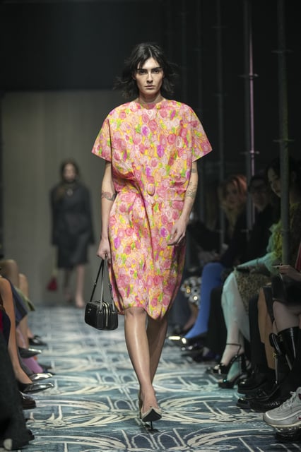 A model wears a creation as part of the Prada Fall/Winter 2025-2026 Womenswear collection presented in Milan, Italy, Thursday, Feb. 27, 2025. (AP Photo/Antonio Calanni)