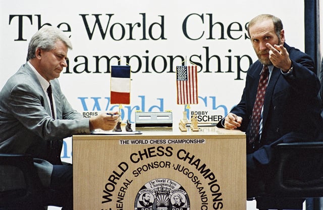 Former world chess champion Bobby Fischer (R) gestures during his match against his archrival Boris Spassky of the Soviet Union, in the Yugoslav resort of Sveti Stefan in this September 1992 file photo./File Photo