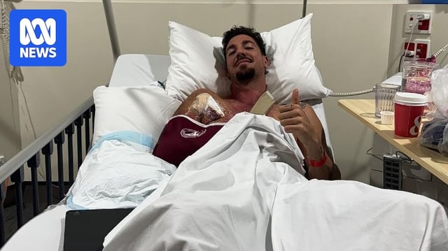 Thanasi Kokkinakis gives thumbs up in a bed