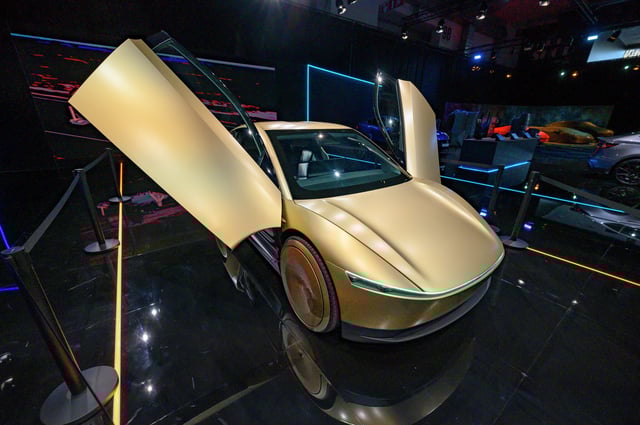Tesla Cybercab, or robotaxi, two-passenger battery-electric self-driving car on display at the AutoSalon on Jan. 10 in Brussels, Belgium. Late last year, the company applied for a permit from the California Public Utilities Commission to operate its own fleet of vehicles.