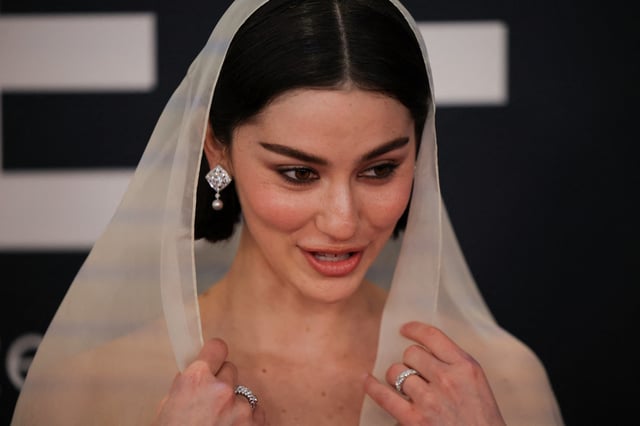 Gracie Abrams poses at the red carpet during the 67th Annual Grammy Awards in Los Angeles, California, U.S., February 2, 2025. REUTERS/Daniel Cole/File Photo