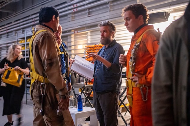 Actors Simu Liu, Woody Harrelson and Finn Cole with director Alex Parkinson on the set of their film LAST BREATH, a Focus Features release.
Credit: Mark Cassar / © 2025 FOCUS FEATURES LLC