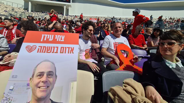 Friends, family and supporters of Tsachi Idan, who was killed in Hamas captivity, crowd Tel Aviv's Bloomfield stadium, home to Hapoel Tel Aviv, for his funeral, Feb. 28, 2025. (Deborah Danan)